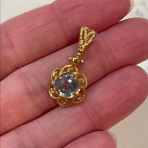Elegant Gold and Aquamarine Pendant